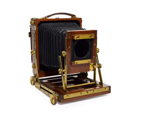 Gandolfi Plate Camera 5x4'' with mahogany body and brass fitting, black bellows have some splits, and maker plaque to sideNo 