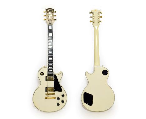 Gibson Les Paul Custom Guitar cream with black scratchplate, two humbucker pickups, three position selector switch, four cont