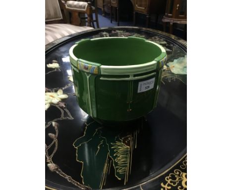 EICHWALD SECESSIONIST POTTERY PLANTER, with stylised floral details in relief on a green ground, 19cm diameter