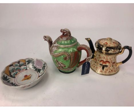 20TH CENTURY CHINESE TEA POT,&nbsp;with dragon decoration, along with other ceramics including bowls, tea pot and a serving t