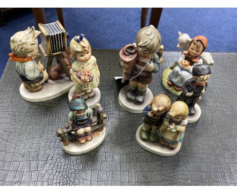 LOT OF HUMMEL CHILD FIGURES, including Little Scholar, 14cm high, From My Garden and five others (7)