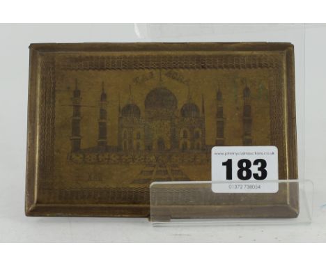 Brass cigarette case with engraving of the Taj Agra on one side a Map of India on the other 