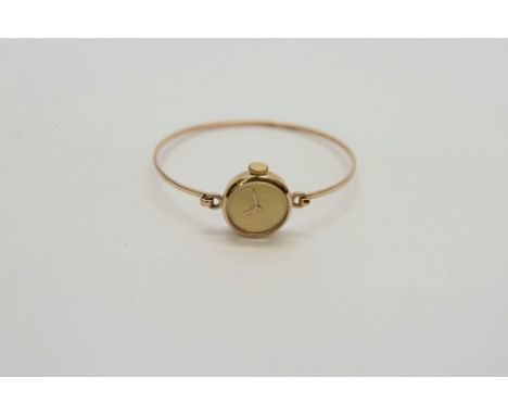 9ct ladies bangle watch by 'Reload' 