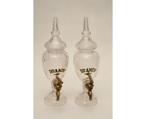 A cut glass used decanter with cover with Brass tap with inscription 'Brandy' in black outlined in gilt 335mm. AF. 