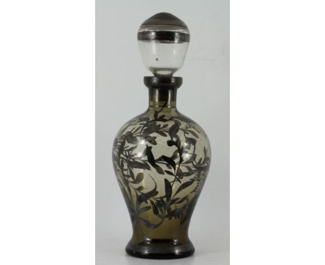 Glass decanter with silver flower design 