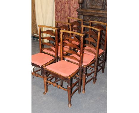 A SET OF SIX 18TH.C.COUNTRY MADE LADDER BACK CHAIRS