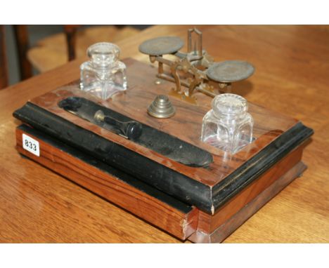 A VICTORIAN MAHOGANY DESKSTAND WITH INTEGRAL LETTER SCALE