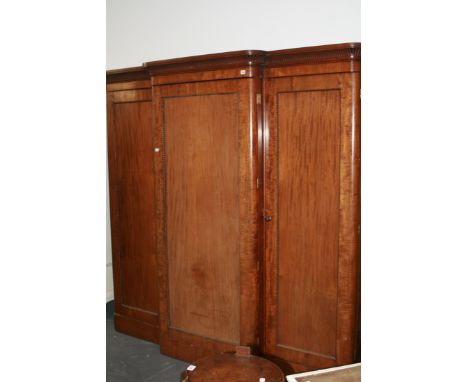 A LARGE VICTORIAN MAHOGANY BREAKFRONT COMPACTUM WARDROBE