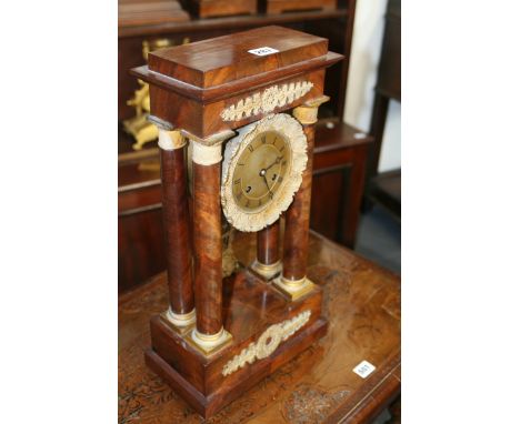 A MID 19TH.C.EMPIRE STYLE PORTICO CLOCK WITH FRENCH BELL STRIKE MOVEMENT AND ORMALU MOUNTS