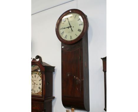 A RARE GEORGIAN MAHOGANY CASED TRUNK DIAL WALL CLOCK WITH TWIN WEIGHT MOVEMENT AND PAINTED DIAL SIGNED T JOYCE, WHITCHURCH