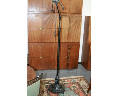 AN UNUSUAL INDUSTRIAL TYPE ADJUSTABLE LAMP STANDARD