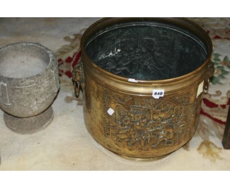 A LARGE BRASS LOG BIN AND A PLANTER