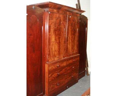 A LARGE MID VICTORIAN MAHOGANY COMPACTUM WARDROBE