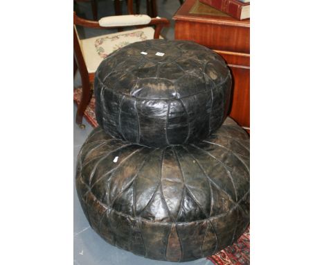 TWO LARGE LEATHER POUFFE