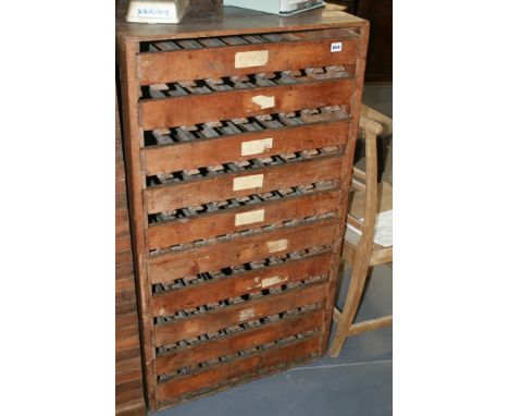 A VINTAGE APPLE RACK