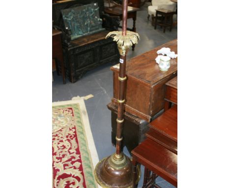 AN ARTS AND CRAFTS COPPER AND BRASS STANDARD LAMP