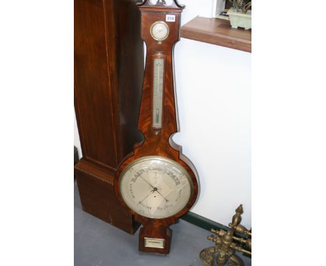 A LARGE REGENCY FLAME MAHOGANY AND EBONY BANDED FOUR GLASS BANJO BAROMETER SIGNED CACANTI ,TOWN MALLING, KENT