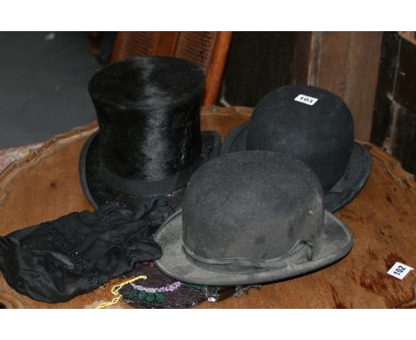 A TOP HAT, TWO BOWLER HATS, EVENING BAGS,ETC