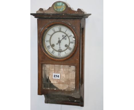 A SMALL VICTORIAN STRIKING WALL CLOCK TOGETHER WITH A CAST IRON CASED STRIKING CLOCK WITH BAROMETER