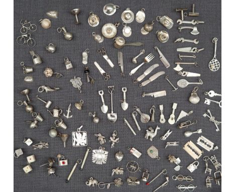 A large collection of white metal charms, including hats, dice, comb, scissors etc, approximately 100 grams