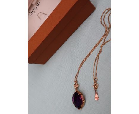 A Clogau 9ct yellow gold amethyst set pendant on a 9ct gold chain, overall approximately 9 grams CONDITION REPORT: Amethyst h