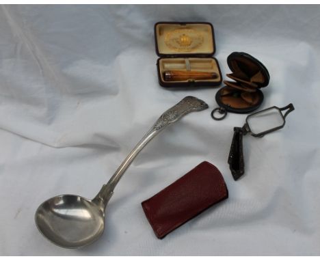 A pair of marcasite set folding glasses, together with a white metal and leather purse, cased amber and yellow metal cheroot 