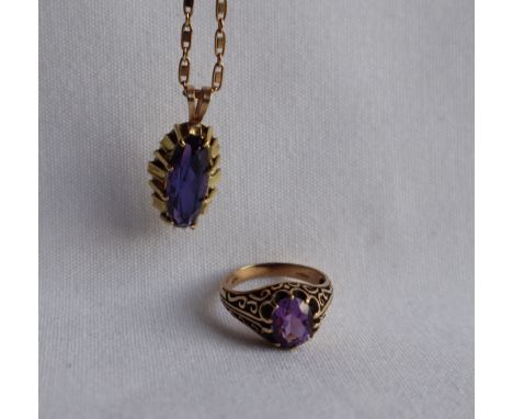 A 9ct yellow gold dress ring, with a single round faceted amethyst, size N, together with an amethyst pendant in a 9ct yellow