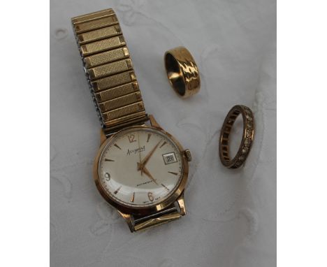 A 9ct yellow gold Gentleman's Accurist wristwatch, the silvered dial with Arabic numerals and batons, on an expanding bracele