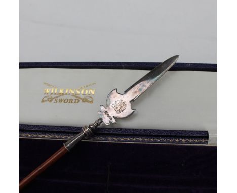 An Elizabeth II silver and rosewood paper knife in the form of a pike, London, 1978, David Shaw Silverware Ltd, 38cm long in 