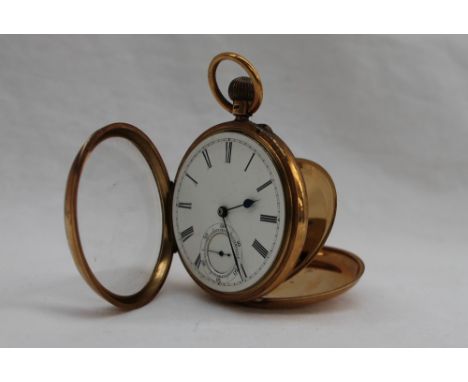 A late Victorian 18ct yellow gold open faced keyless wound pocket watch, the enamel dial with Roman numerals and a seconds su