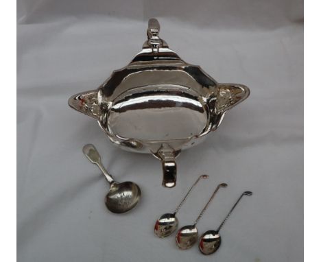 A George V silver double ended sauce boat in the George I style, with scrolling handles and an oval spreading foot, London, 1