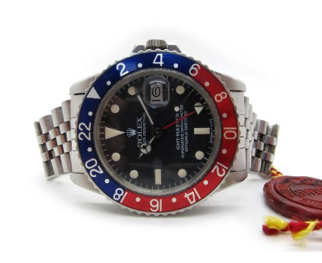 Rolex; A 1960's GMT Master Automatic Gent's Wristwatch, Ref:1675, Serial No:1404391, the signed black dial ("Swiss-T&lt;25") 