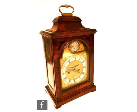 A Georgian style walnut cased bracket clock with a twin fusee movement striking on a bell, the movement unsigned, with an 8" 