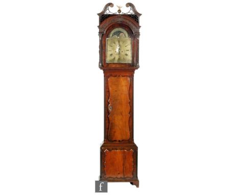 A 19th Century mahogany longcase clock with eight-day movement striking on a bell, the case with twin swan neck fret-cut pedi