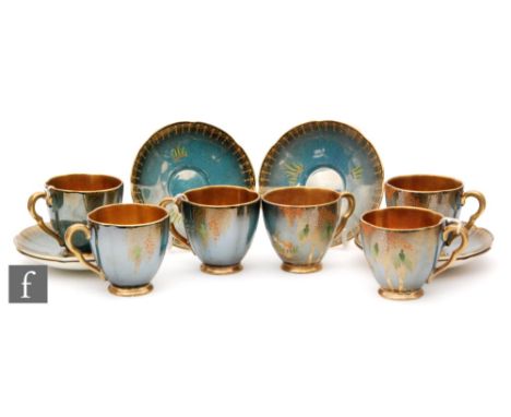 A set of six Carlton Ware New Stork pattern coffee cups and saucers, each decorated with gilt and enamel Chinoiserie decorati