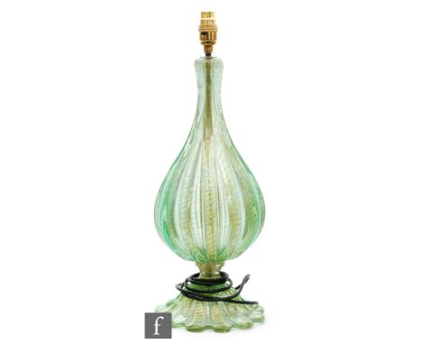 A later 20th Century Murano glass table lamp in the manner of Barovier, of fluted ovoid form raised to a capstan stem and fla