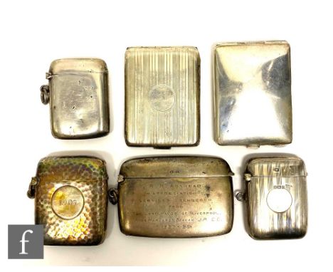 A collection of six early 20th Century silver hallmarked vesta cases of varying design, to include plain, hammered, engine tu