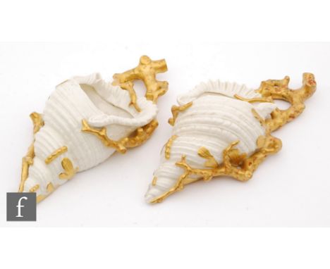 A pair of late 19th Century Royal Worcester wall pockets formed as a white conch shell with gilt sea weed moulding and gilt a