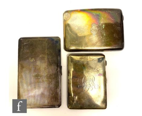 A collection of three 20th Century silver hallmarked cigarette cases, to include an engine turned example, a case engraved wi