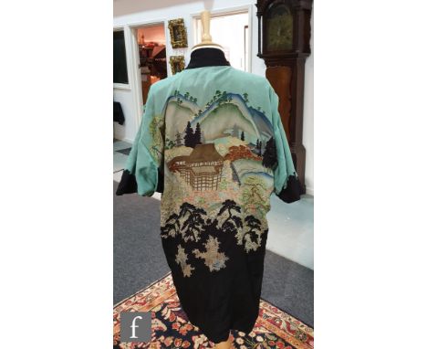 A 1930s ladies vintage reversible kimono with a printed Oriental landscape to one side and black to the other, together with 
