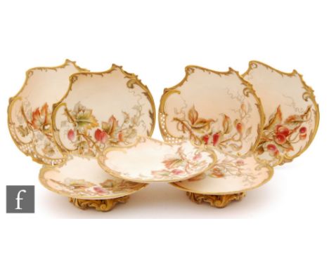 A late 19th Century Royal Worcester shape 1426 part shaped dessert service comprising two tazza and five plates, each decorat