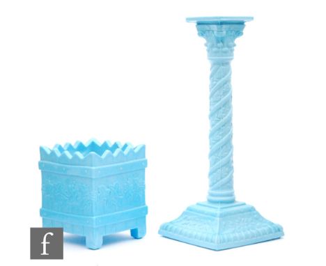 A 19th Century Sowerby blue pressed glass candlestick, the pedestal with a wrythen moulded garland, height 20cm, together wit