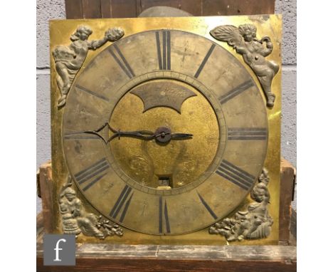 An 18th Century oak longcase clock with later associated 30-hour movement striking on a bell, the 11 inch square brass dial b