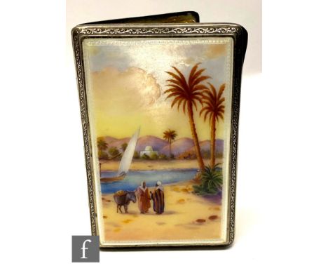An early 20th Century hallmarked silver cigarette case of rectangular form, the hinged cover with a guilloche enamel decorate