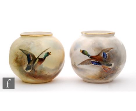 A matched pair of Royal Worcester shape G161 vases of ovoid wrythen form each panel decorated with a mallard duck in flight, 