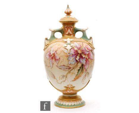 A Royal Worcester blush ivory pedestal vase and cover shape 1654 decorated with flowers and foliage with raised gilt detailin