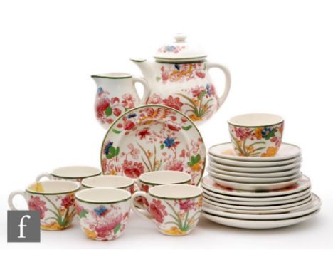A 1930s Wedgwood children's teaset comprising teapot, six cups, six saucers, six tea plates, two side plates and a milk jug, 