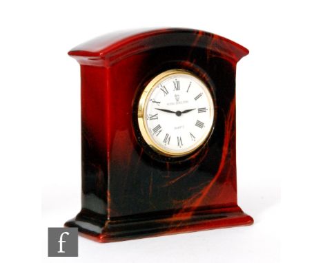A small Royal Doulton Flambe mantel clock decorated with fissured and veined marbling, printed mark, height 8cm. 