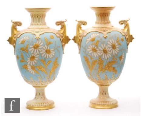 A pair of Royal Worcester shape 1618 pedestal vases each decorated with a spray of daisies with gilt detailing against a matt