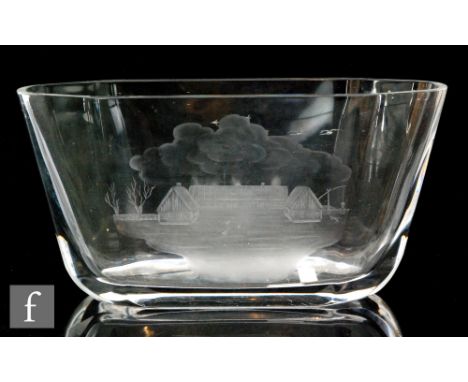 A 1940s Orrefors clear crystal vase by Edward Hald, of wide compressed form and engraved with a farm landscape to one side an